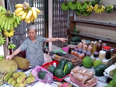 Durians, jackfrutis, watermelon and bananas for sale; Saigon fruit seller