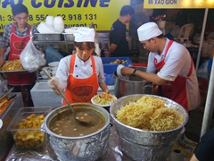Crispy noodle dishes, one of dozens of booths at the International Food Festival