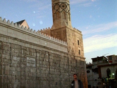 Robby next to the Umayyad Mosque at sunset during our walk about old Damascus
