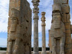 The western threshold of the "Gate of All Nations" is guarded by a set of Lamassus (the Assyrian winged bulls with the heads of bearded men); Persepolis 