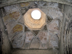 The intricate dome interior of a mosque