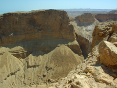 The inhospitable terrain surrounding Masada's fortress, which has become a symbol of Jewish Resistance as recorded by historian Josephus Flavius. Masada served as the last rebel stronghold in Judea against the Roman 10th Legion and its inhabitants chose death over conquest in AD 66