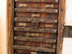 Typical Shibam cedar door. Note: Unfortunately, antique stores in Shibam have taken to selling their history. Many original cedar doors and windows are found for sale