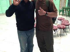 Our super friendly caretaker poses with Robby at Dar Ya hostel in Tunis