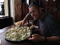Robby excited as he is about to taste his first khinkali (Georgia dumpling)