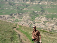 Robby hiking down Mount Gareja