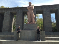 The boys mimic a statue in Yerevan
