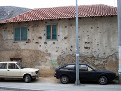Bullet-strewn buildings are unfortunately a common sight in Bosnia