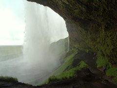 View from behind Seljalandsfoss. Make sure to wear waterproof gear as you will get super soaked!