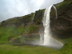 A rainbow appears before Seljalandsfoss

