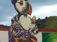 A puffin mascot at a bar; Heimaey Island