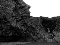 Robby strikes a pose on top of the basalt cliffs of Kirkjufjara