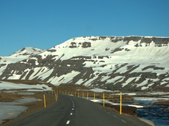 Snow still covers the mountains up at the Fjardarheidi Pass leading to Seyðisfjörður