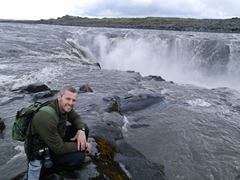 Another view of Robby next to his favorite waterfall of our entire trip, the impressive Selfoss
