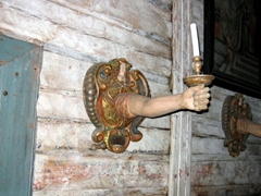 A bizarre candlestick holder (what is even more interesting is that there are several of these "candlestick holders" lining the interior walls of a church at the Seurasaari Open Air Museum