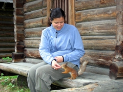 Becky feeds a friendly squirrel some nuts at the Helsinki open air museum (the squirrels here must get fed a lot as they have no problems approaching people seeking food)