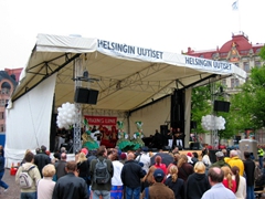 Locals gather around for some free entertainment in downtown Helsinki