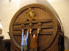 Becky & Jim are dwarfed by the enormous vat of wine; Heidelberg Castle