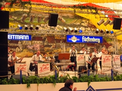 A large Oom-pah band entertains the crowded tent at the Walter Weitmann Fest Tent (5000 seat capacity...although countless patrons take to tabletop dancing after a few beers)