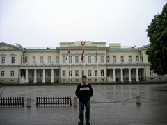 Robby standing in front of Lithuanian Parliament building, Vilnius